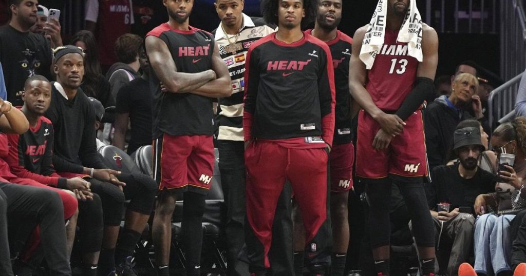 Jimmy Butler is headed to the Golden State Warriors, Andrew Wiggins to Miami Heat, AP source says