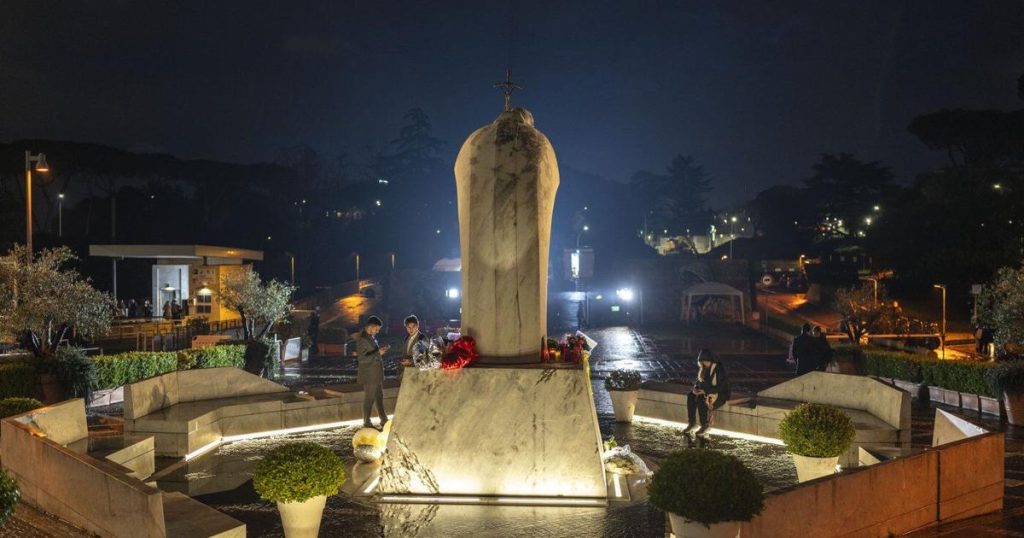 Pope Francis sits upright in an armchair as Argentines in Rome pray for his recovery