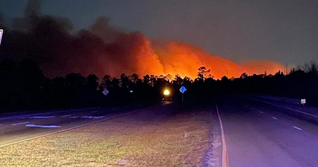 Crews battle wildfires in North and South Carolina amid dry conditions and gusty winds