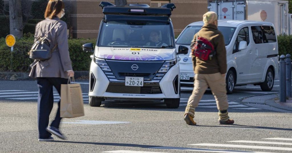 Japan’s Nissan tests driverless vehicles in city streets filled with cars and people