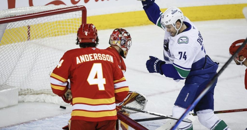 Canucks come back to edge Flames 4-3 in shootout as wild-card race heats up