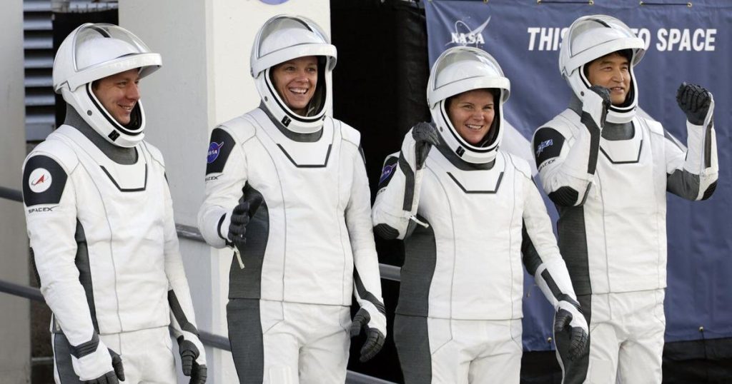 NASA’s stuck astronauts welcome their newly arrived replacements to the space station