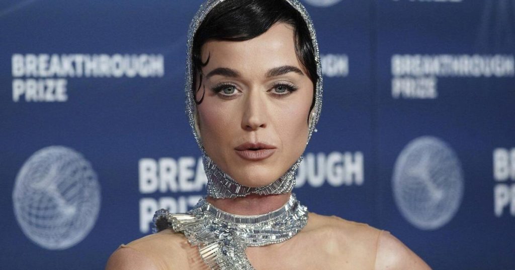 Ahead of spaceflight, Katy Perry is reading Carl Sagan and channeling her ‘feminine divine’