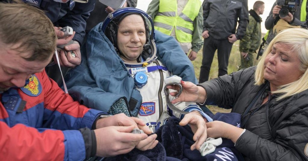 A Soyuz capsule with 2 Russians and 1 American returns to Earth from the International Space Station