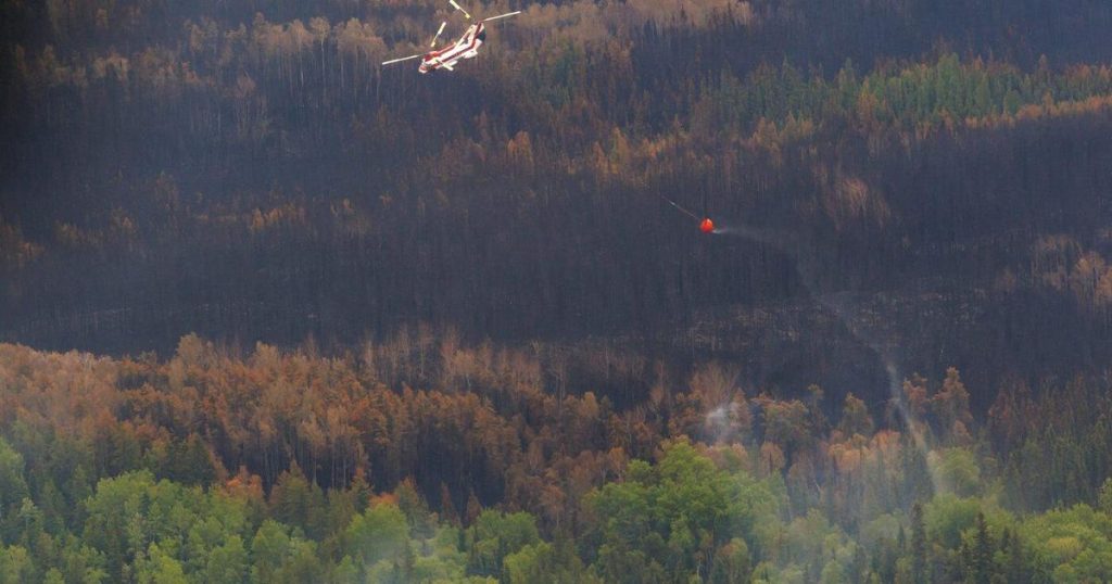 Northern Manitoba town orders evacuation as wildfire threatens power