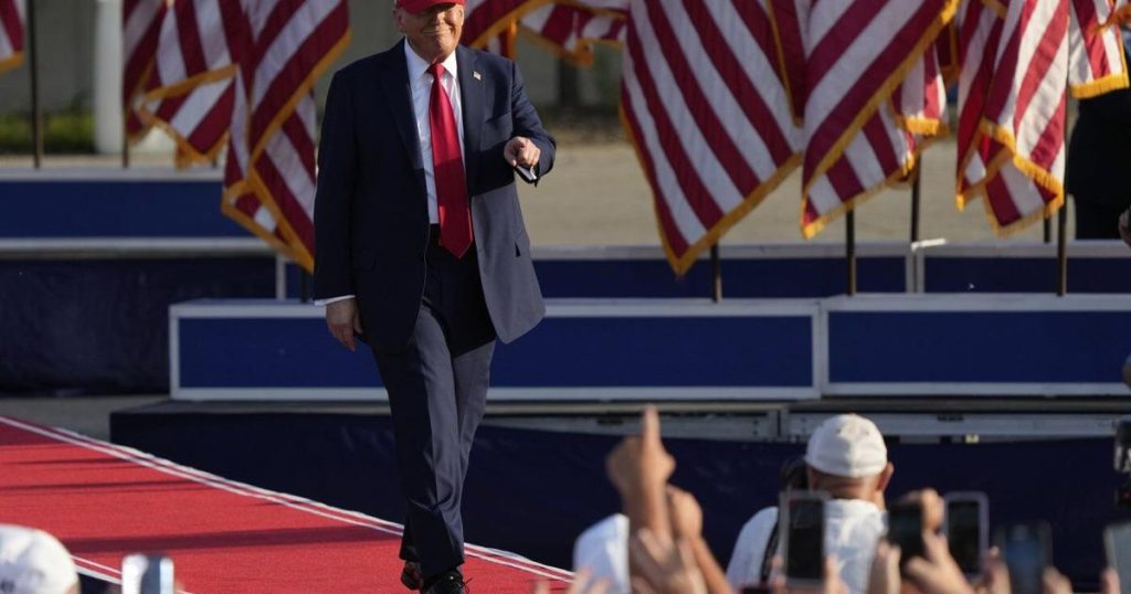 Trump signs his tax and spending cut bill at the White House July 4 picnic