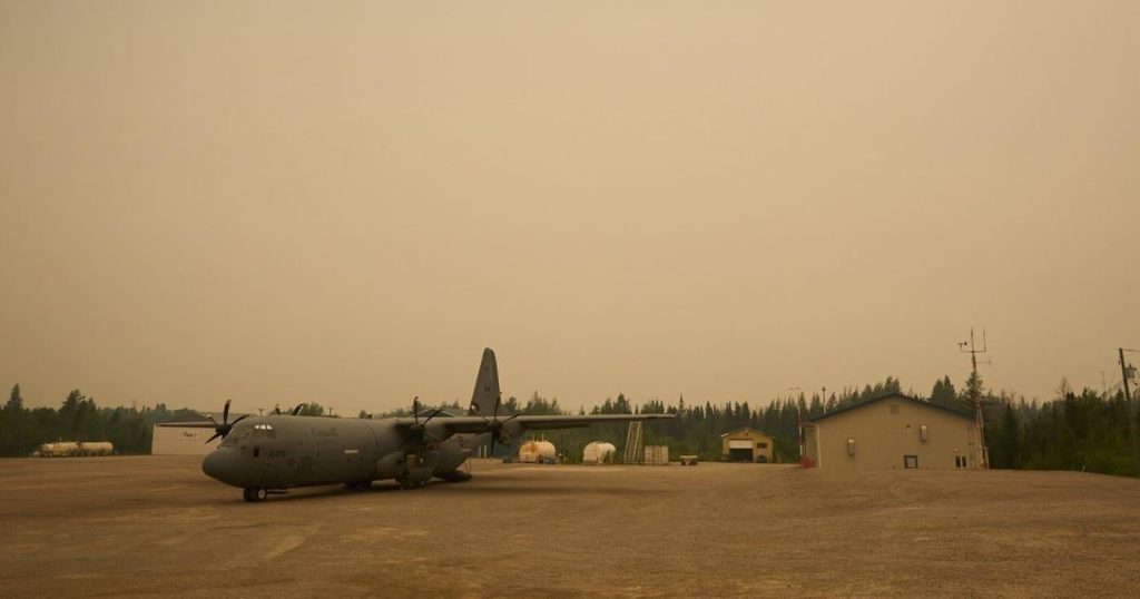 In the news today: Over 1,000 people flown from fire-threatened Manitoba community