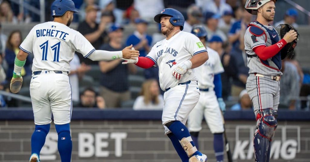 Kirk, Gimenez hit home runs to power Blue Jays to 10-4 rout of Twins