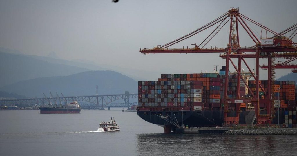Statistics Canada reports merchandise trade deficit .9 billion in July
