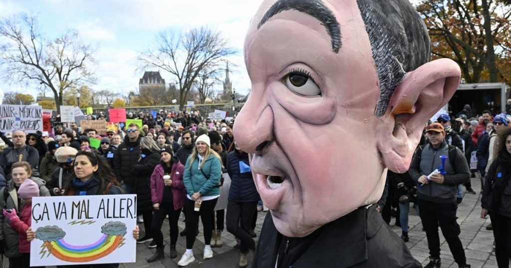 Doctors gather to protest physician payment bill at Bell Centre