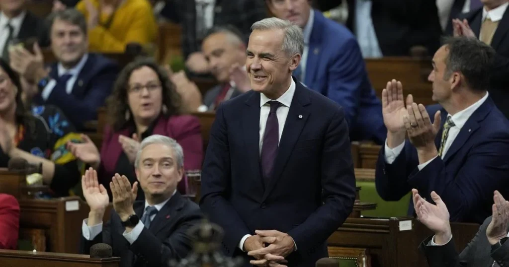 In the news today: Carney government’s budget survives tight vote