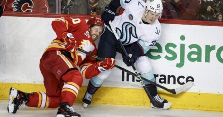 Surging Kraken score four times in third period to burn Flames 5-1 Surging Kraken score four times in third period to burn Flames 5-1