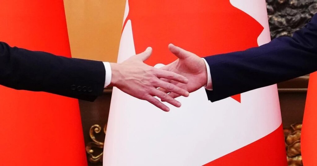 Photo Gallery: Carney reaches ‘landmark’ tariff-quota deal with China on EVs, canola