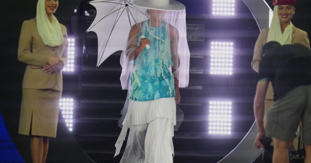 Naomi Osaka makes a grand entrance and a big fashion statement at Australian Open