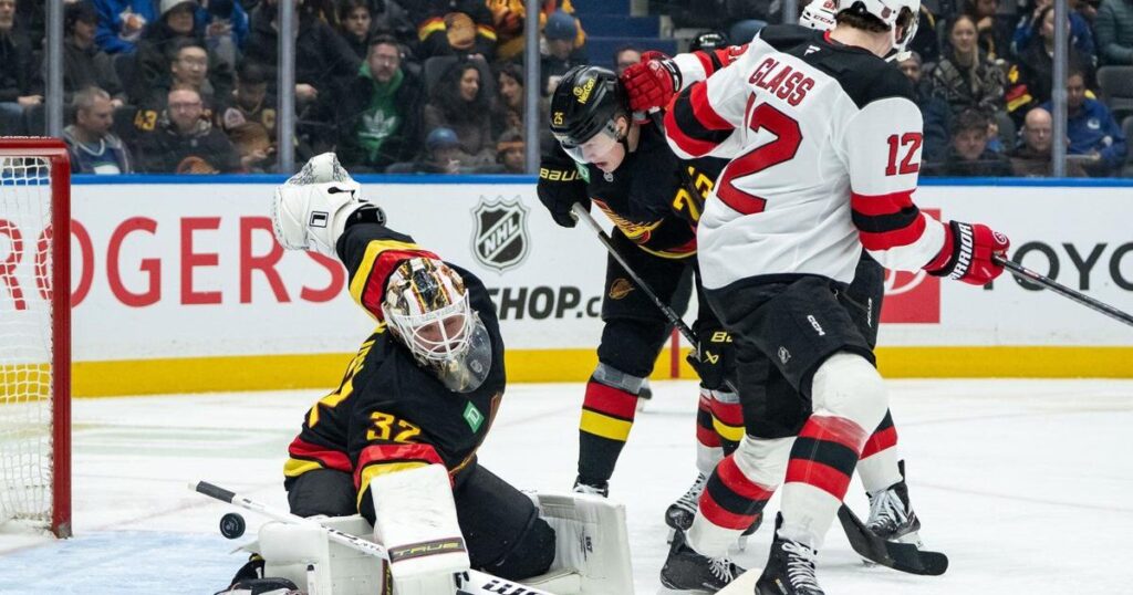 Glass scores twice as New Jersey Devils capture 5-4 victory over Vancouver Canucks