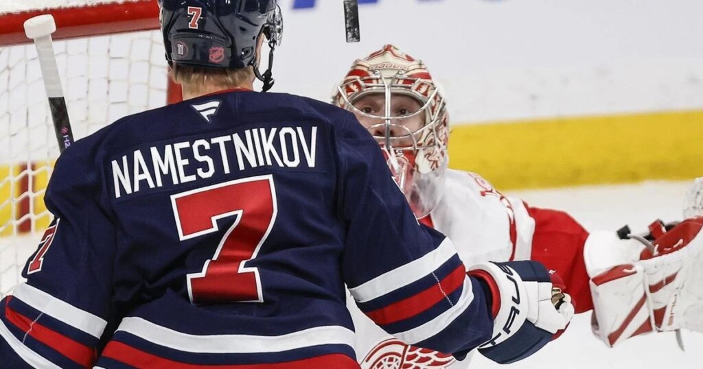 Red Wings score four times in third period to ground Jets 5-1