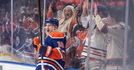 Hyman scores, Oilers come back to beat Sharks 4-3 in overtime