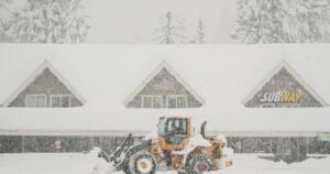 Officials work to lower risk of deadly slides to recover bodies of California avalanche victims