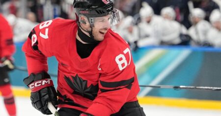 Dubois wins short-track gold, Canada edges Czechia in men’s hockey at Winter Olympics
