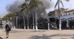 Canadian tourists sheltering in place in Mexico recount burnt-out cars, lines for food
