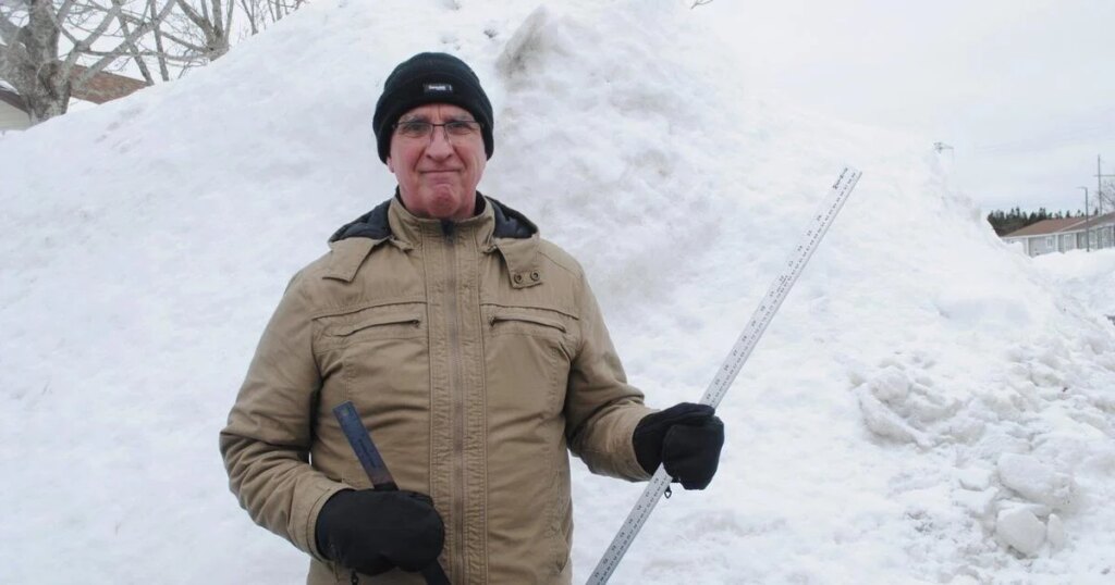 ‘Old guy with a ruler’ keeping Newfoundland informed through record-breaking snowfall