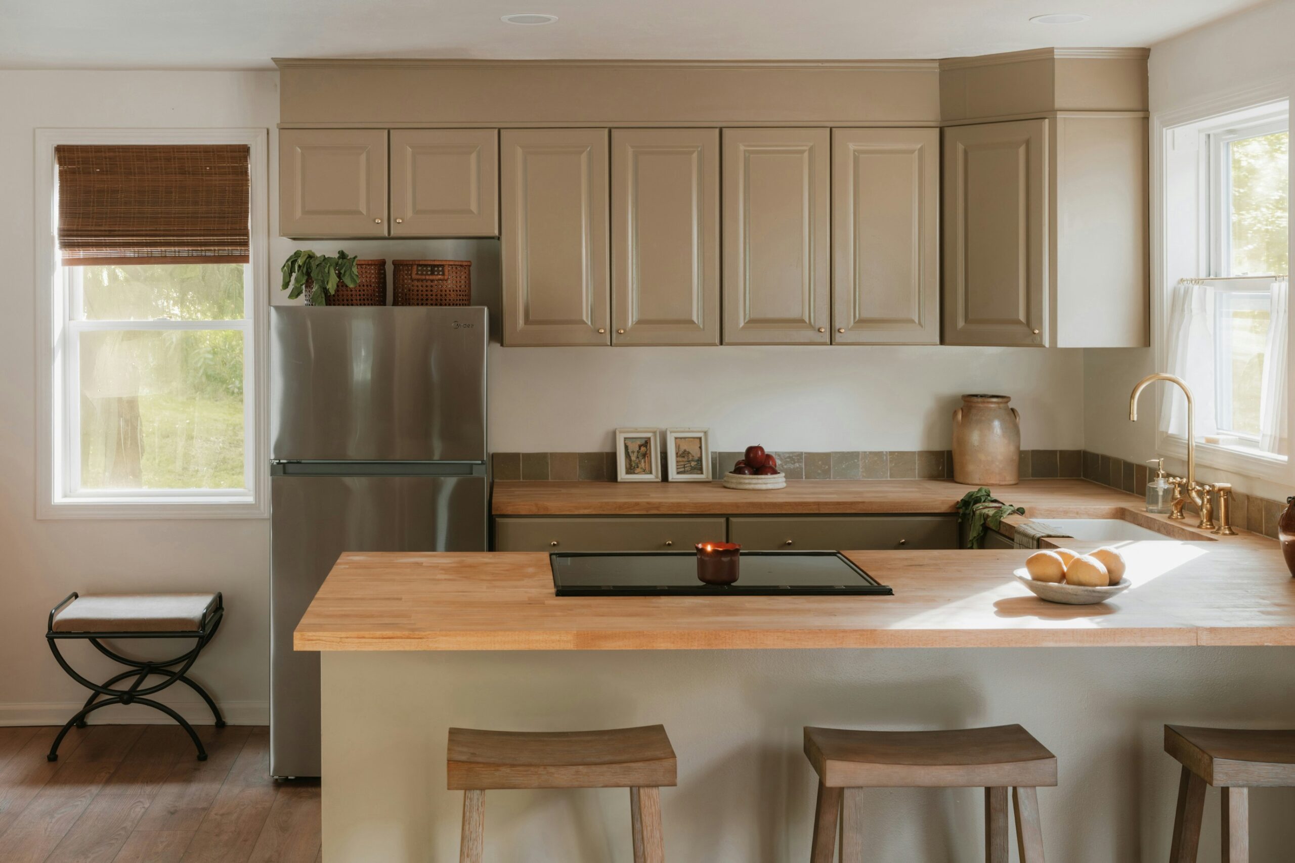 An apartment kitchen interior with natural light