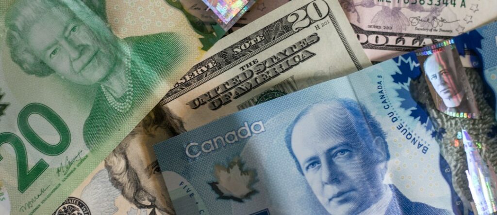 Loonie Sinks to Weakest Level Since July