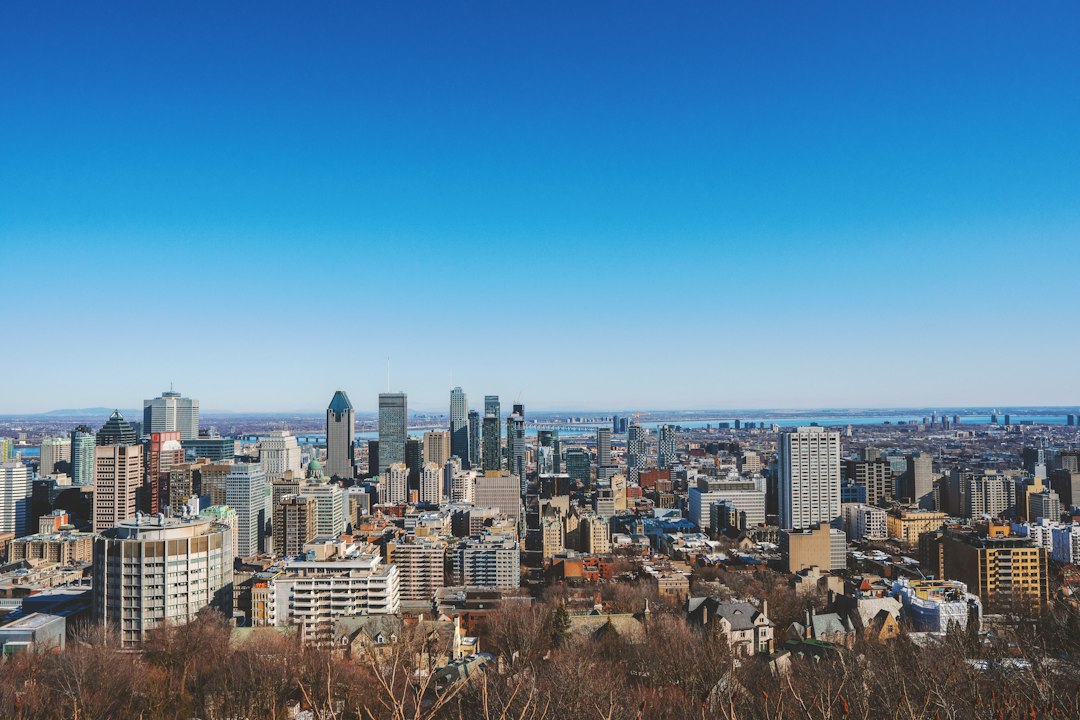 A Canadian city skyline under a blue sky, illustrative stock photo of a neighbourhood view