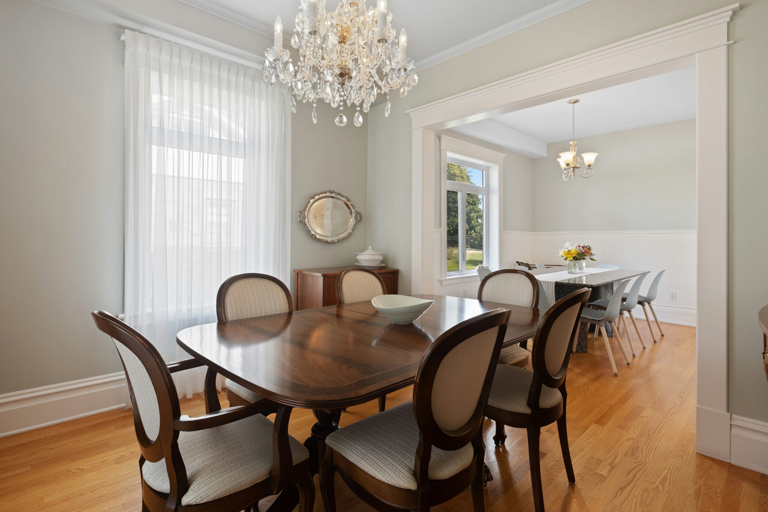 Elegant dining room with chandelier and dining table