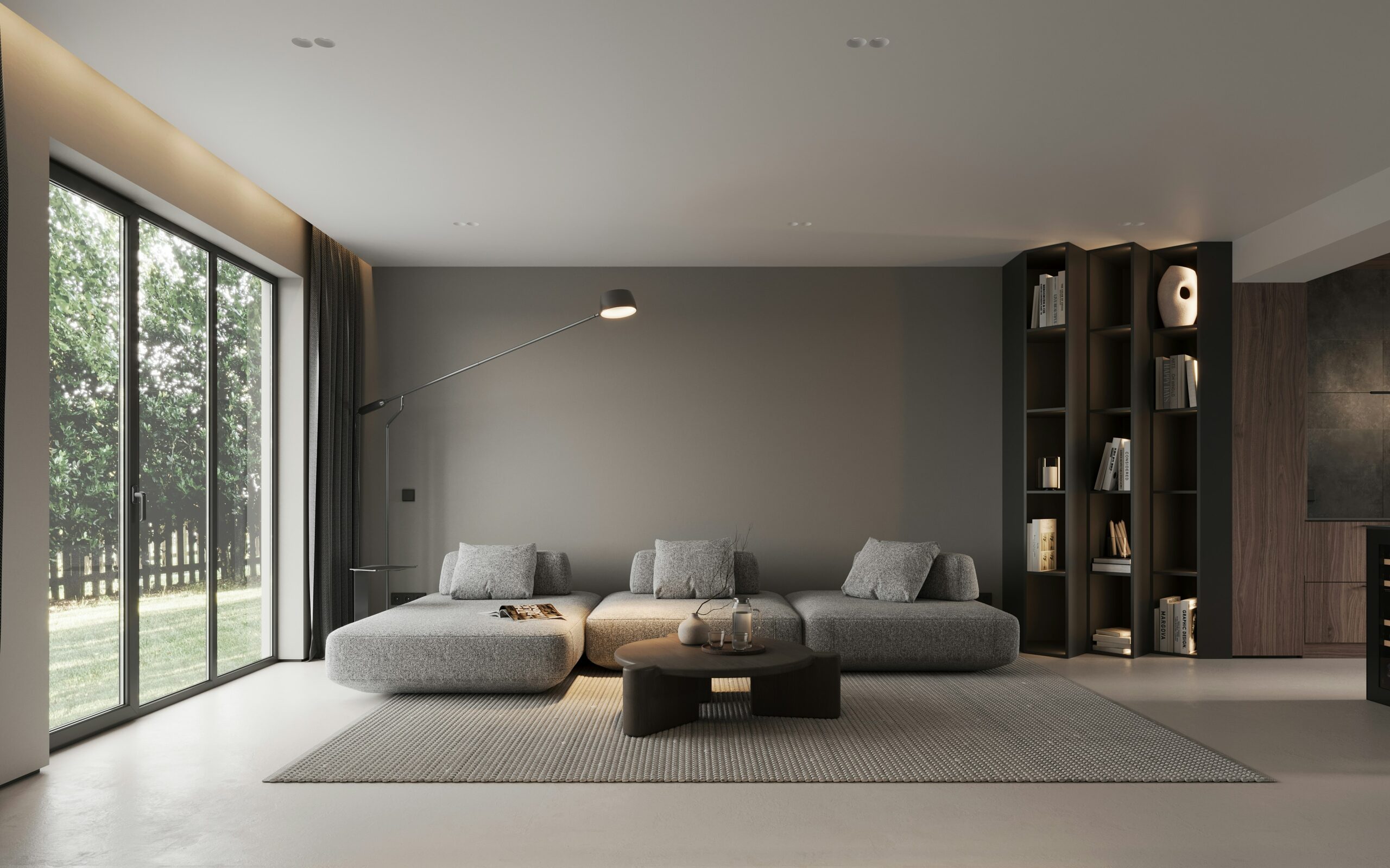 A modern living room with a large window and natural light
