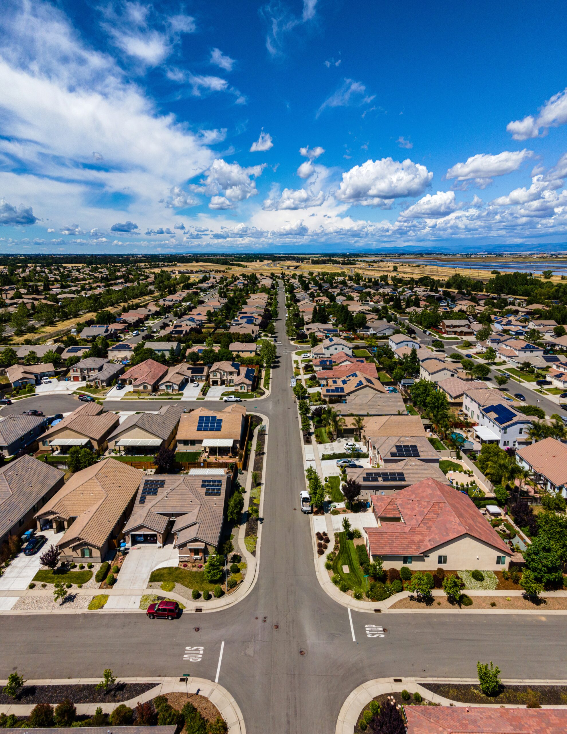Aerial view of a suburban residential street, illustrative stock photo