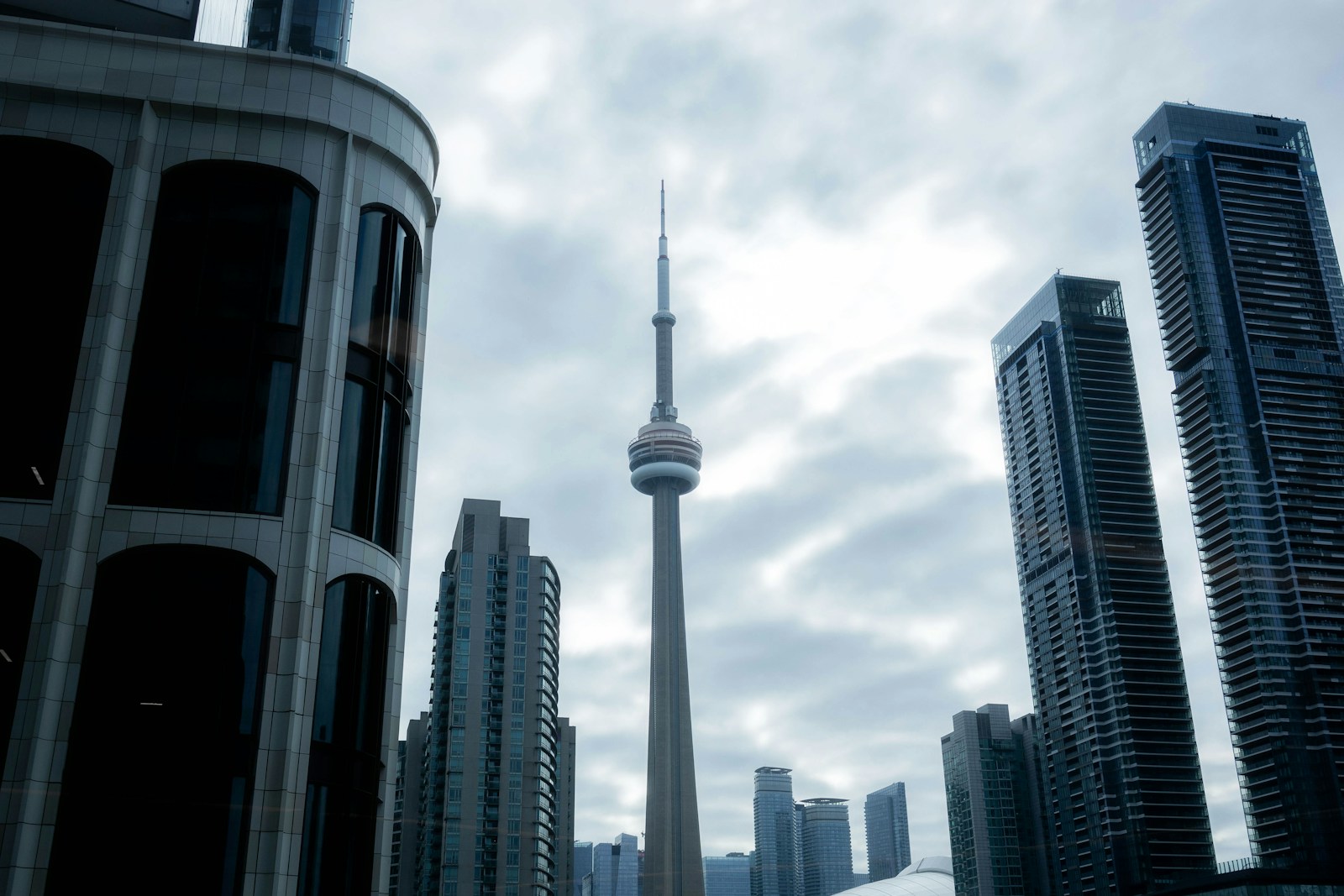 Illustrative stock photograph of condominium towers in downtown Toronto with the CN Tower behind them.