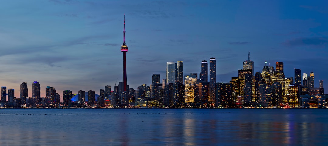 Illustrative stock photograph of the Toronto skyline seen from the Toronto Islands.