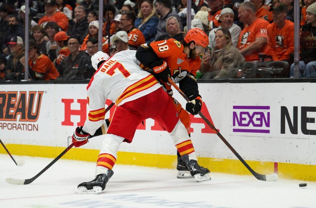 Pospisil’s late goal lifts Flames past Ducks 4-2