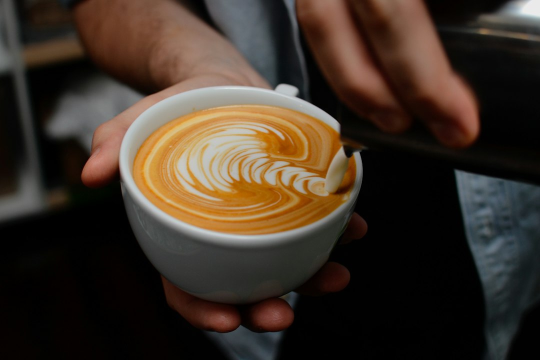 Latte with art poured into the foam