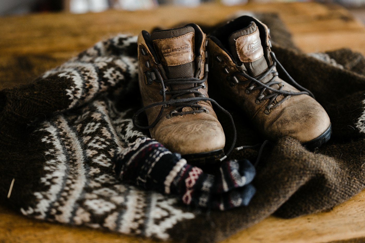 Brown leather lace-up boots, the kind of footwear merino socks are worn with