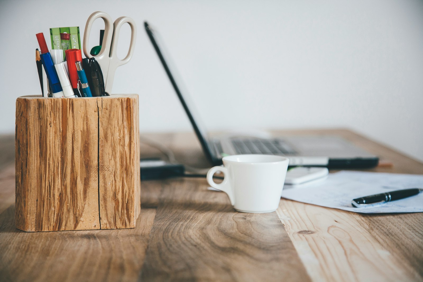 Shared office workstation with a desk and coffee, a typical coworker gift setting