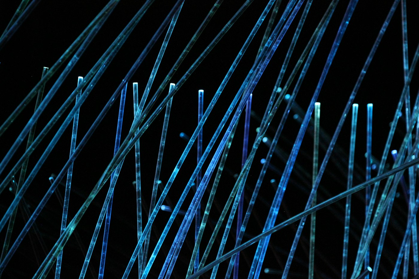Blue and white lights glowing in a dark space, a stand-in for light-up wearables