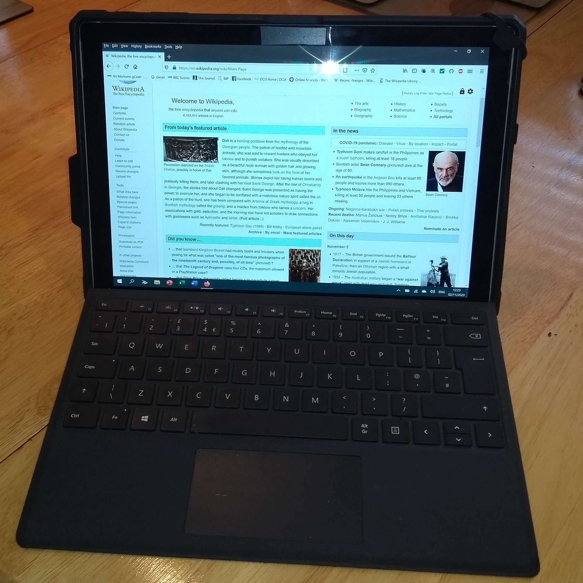 An older Microsoft Surface Pro 6 tablet on a desk