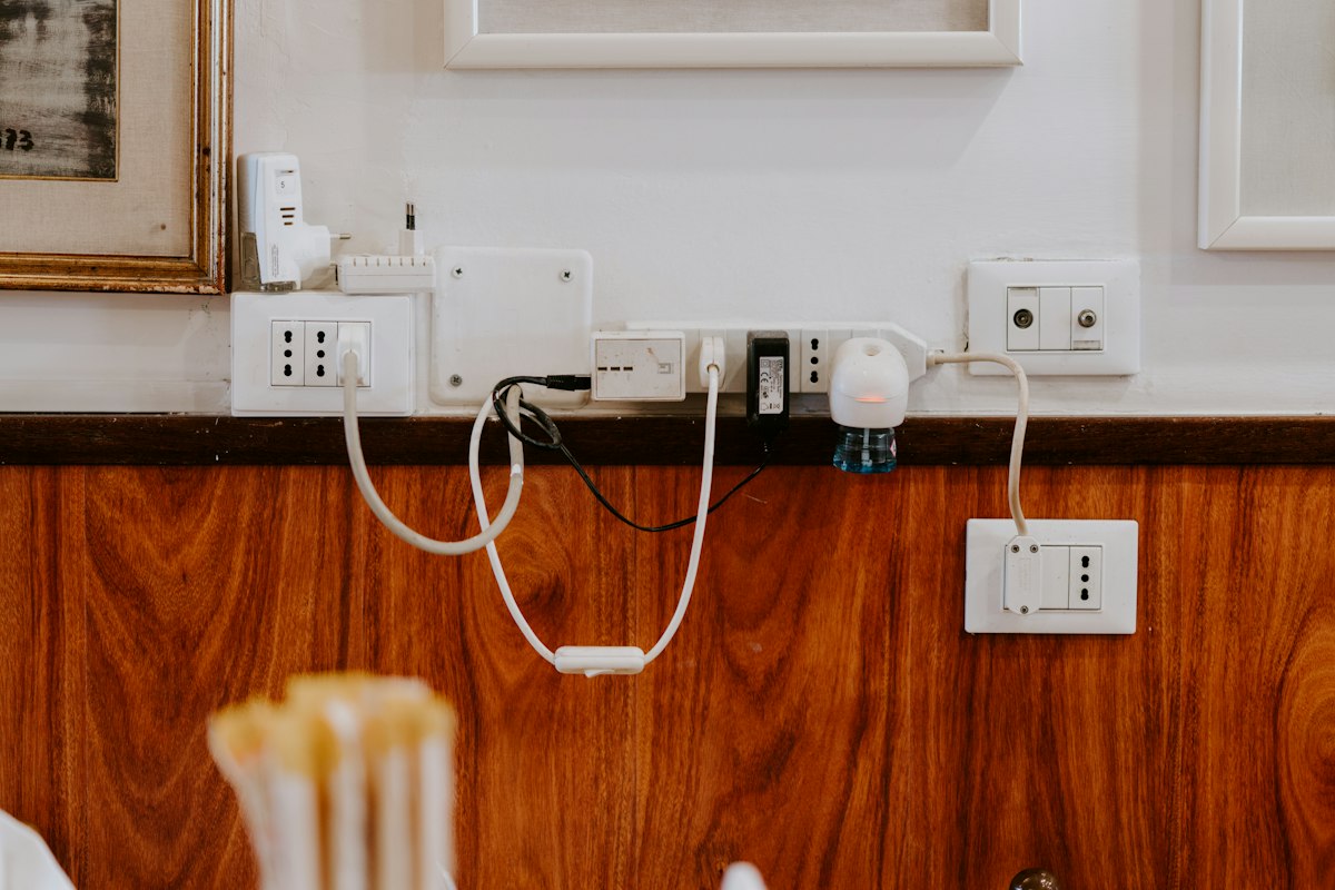 White power strip on a wooden floor