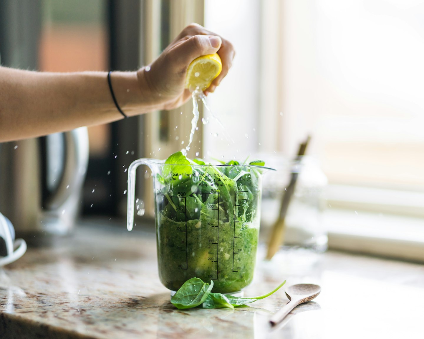 Green smoothie in a glass, the kind of blend a high-performance blender is built for